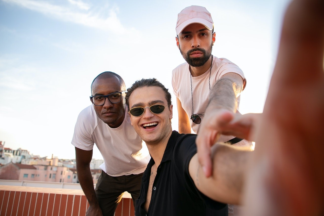 three guys taking a selfie