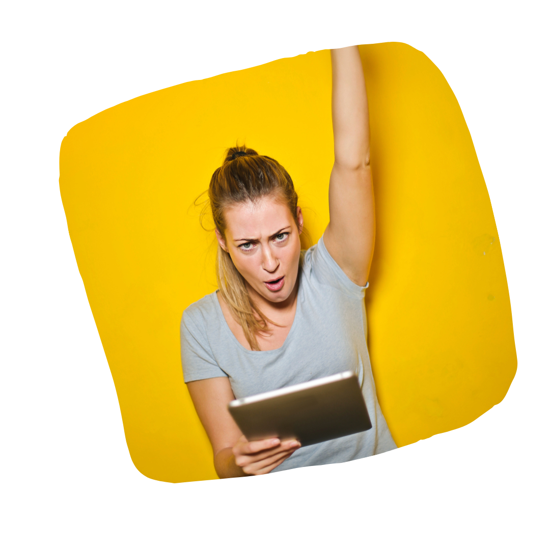 a girl cheering and holding a tablet