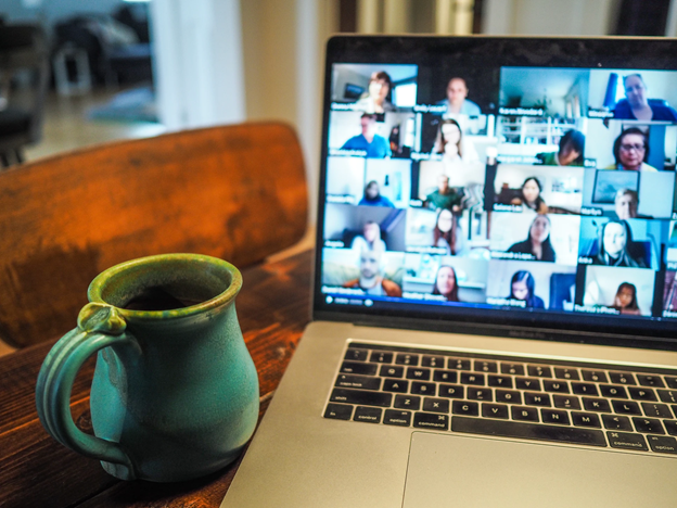 a cup of coffee and a laptop